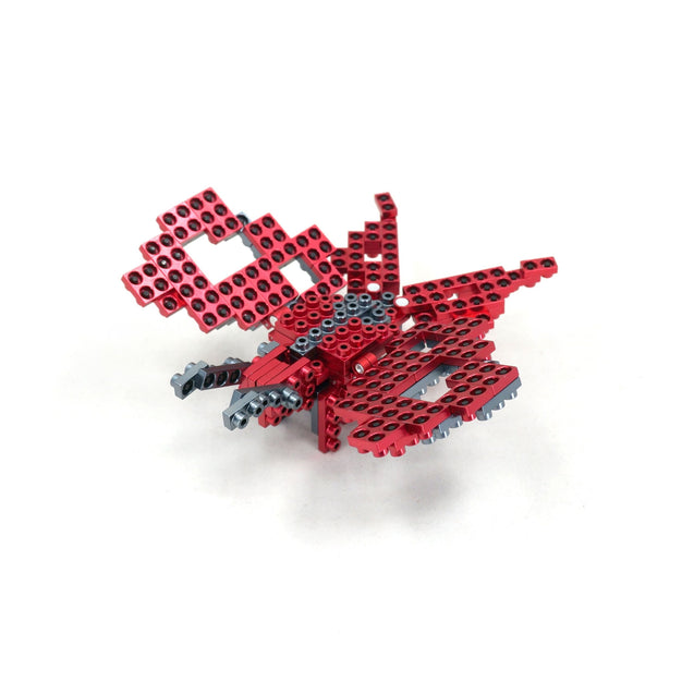 METOMICS94000004Gecko3-in-1_RubyRed_butterfly